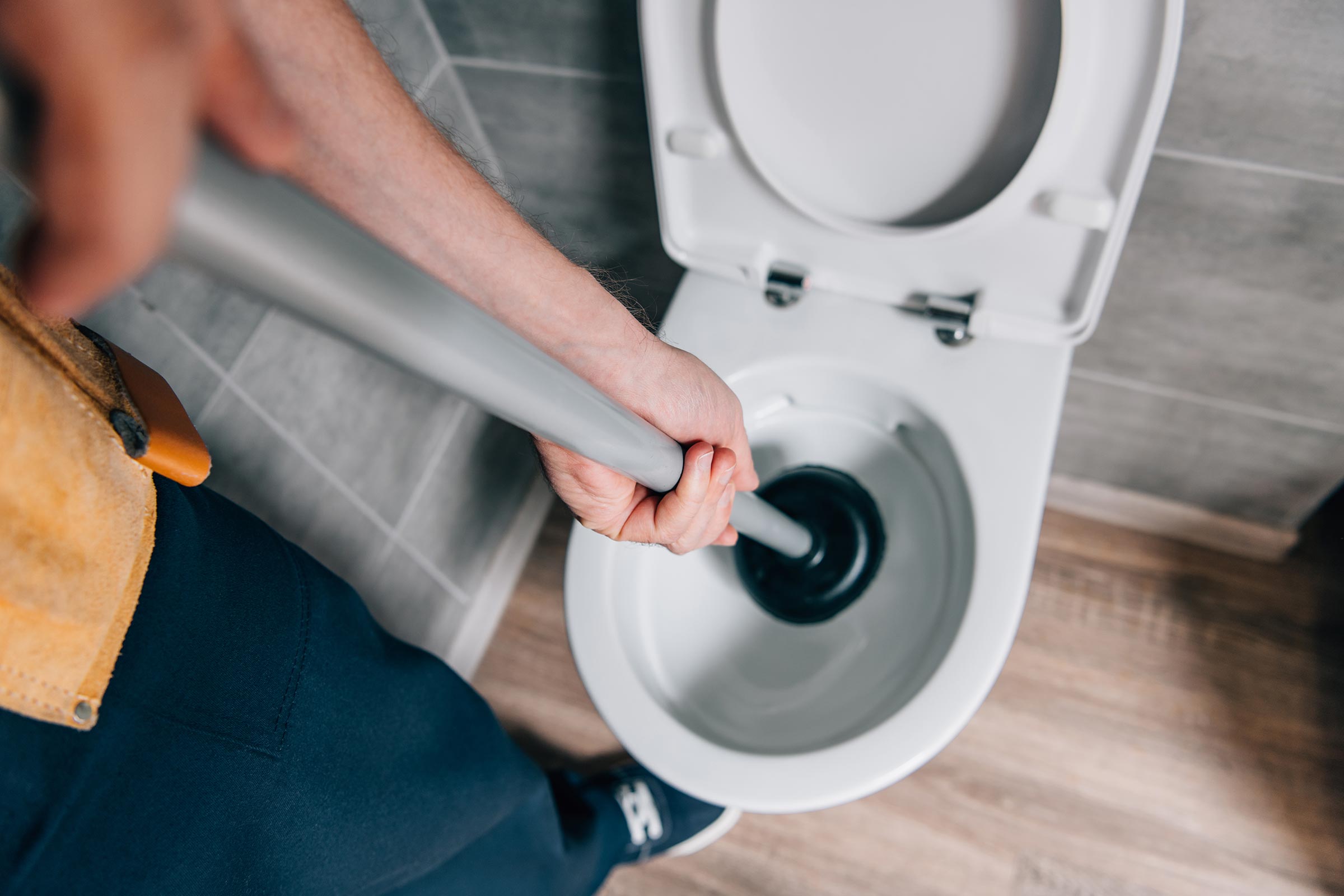 how to unblock a toilet without a plumber